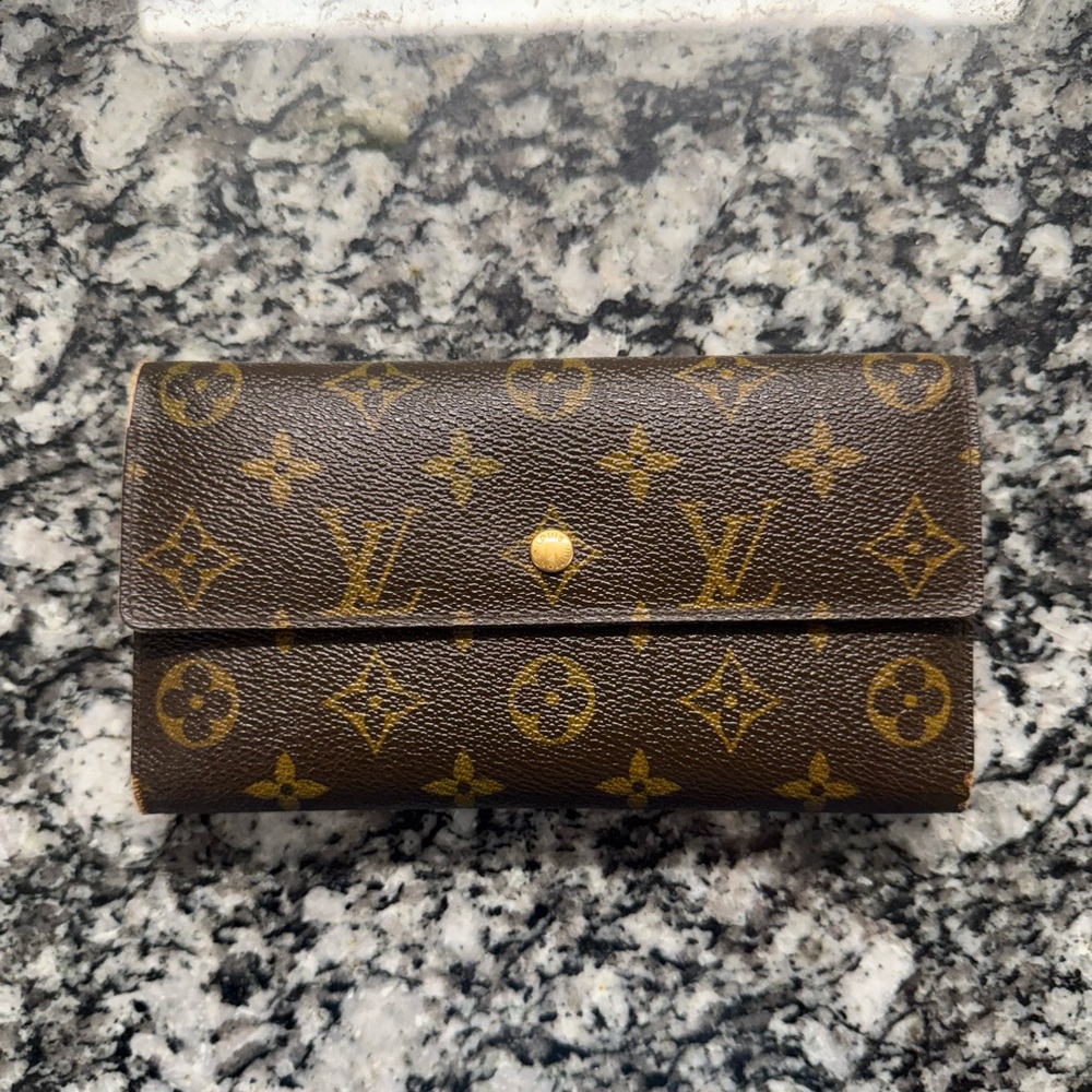 Louis Vuitton | Monogram Leather International long tri-fold wallet